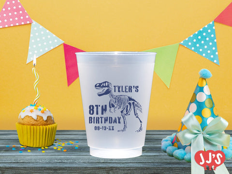 Roar-Some Adventure Dinosaur Birthday Custom Plastic Cups from JJ's Party House in McAllen, Texas. Featuring a friendly dinosaur on an adventure, these customizable cups are perfect for Dinosaur first birthday party supplies and will be a hit with your little explorer's guests. Personalize them with your child's name and age for a unique party favor that's built to last.