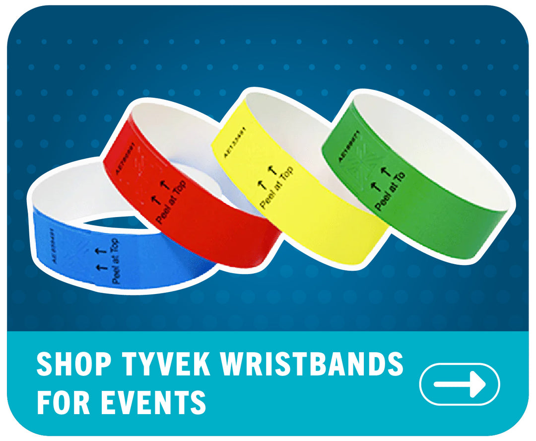 A close-up image of four Tyvek wristbands in vibrant colors: blue, red, yellow, and green, arranged side by side, showcasing their durability and serialized unique count numbers for event security. JJs Party House McAllen
