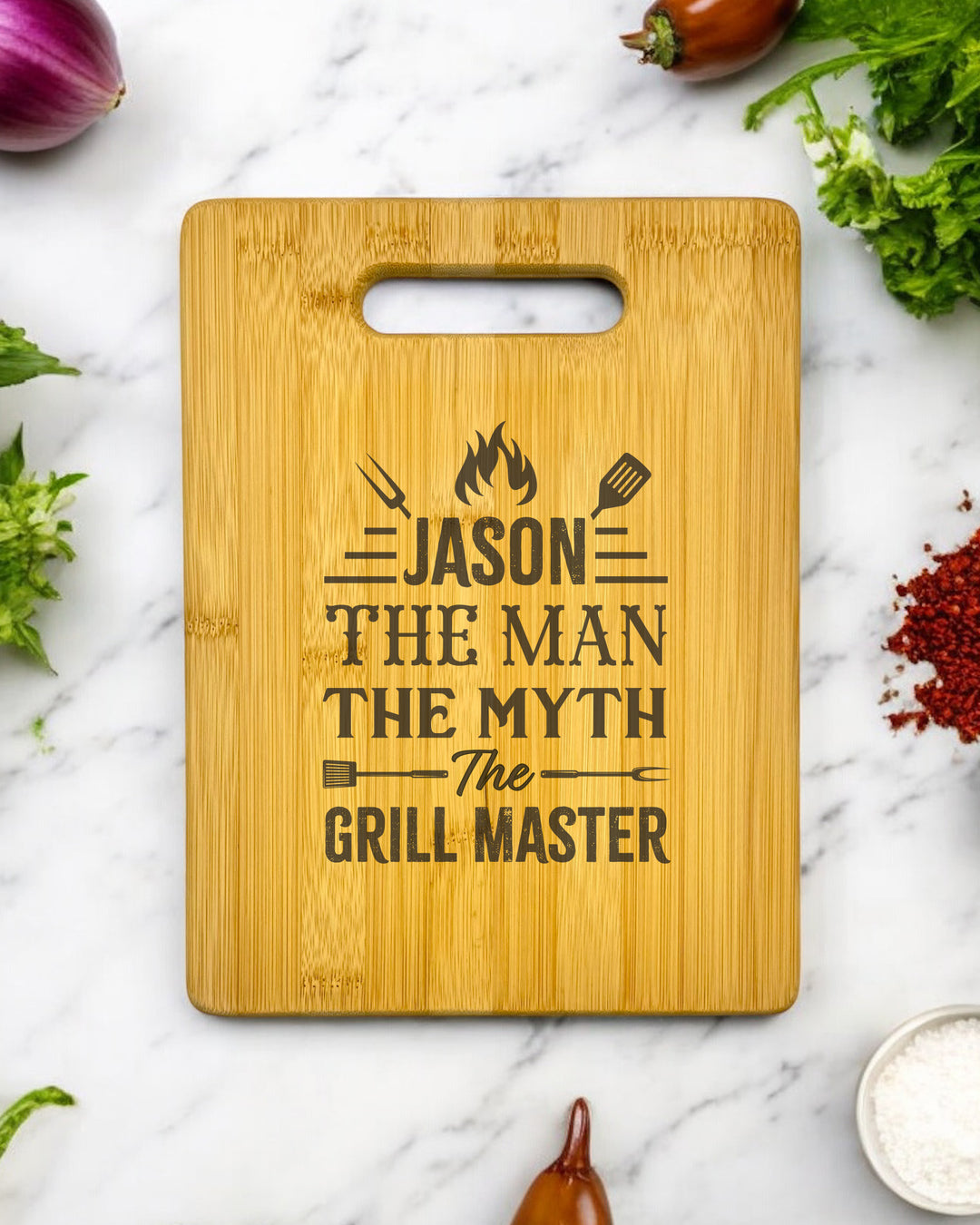 Personalized bamboo cutting board with the engraving "The Man The Myth The Grill Master."