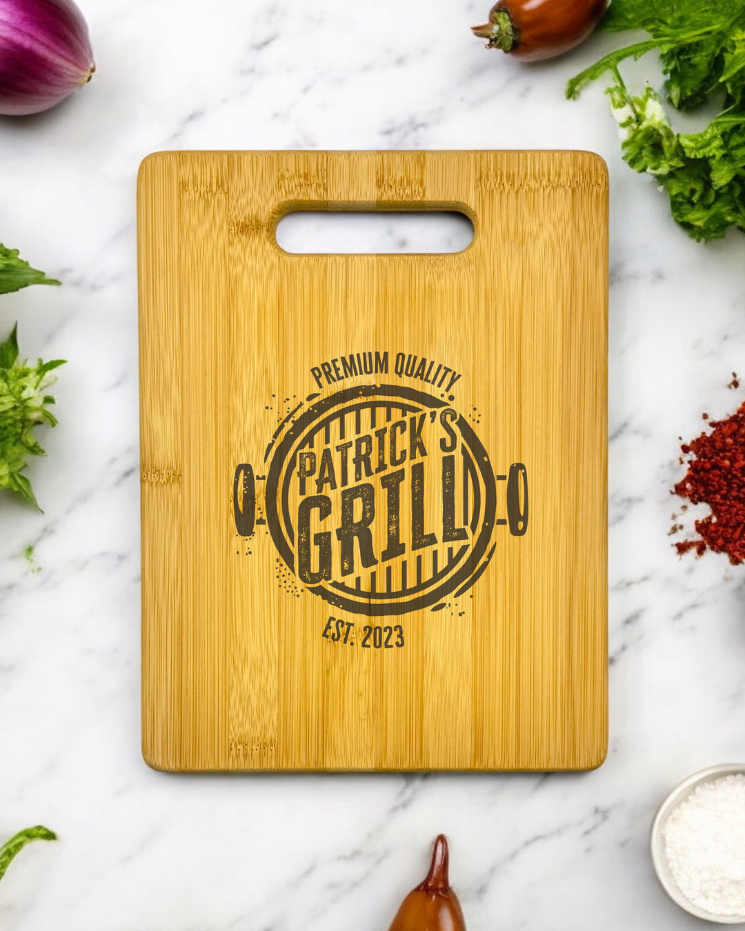 A personalized bamboo cutting board with a grill design, featuring a custom name or message.